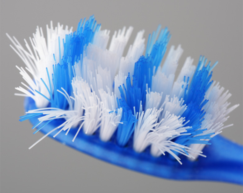 Cerdas desgastadas de un cepillo de dientes